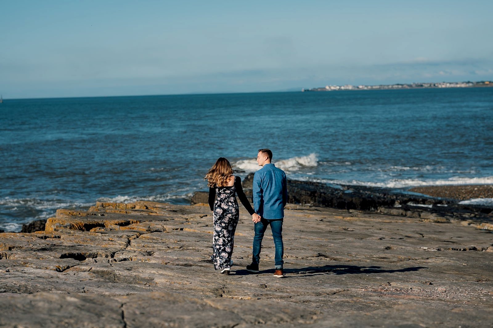 amy and nath walking to the beach
