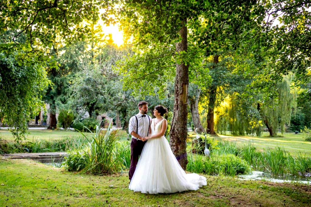 Bride & Groom holding hands at a South Wales Wedding venue